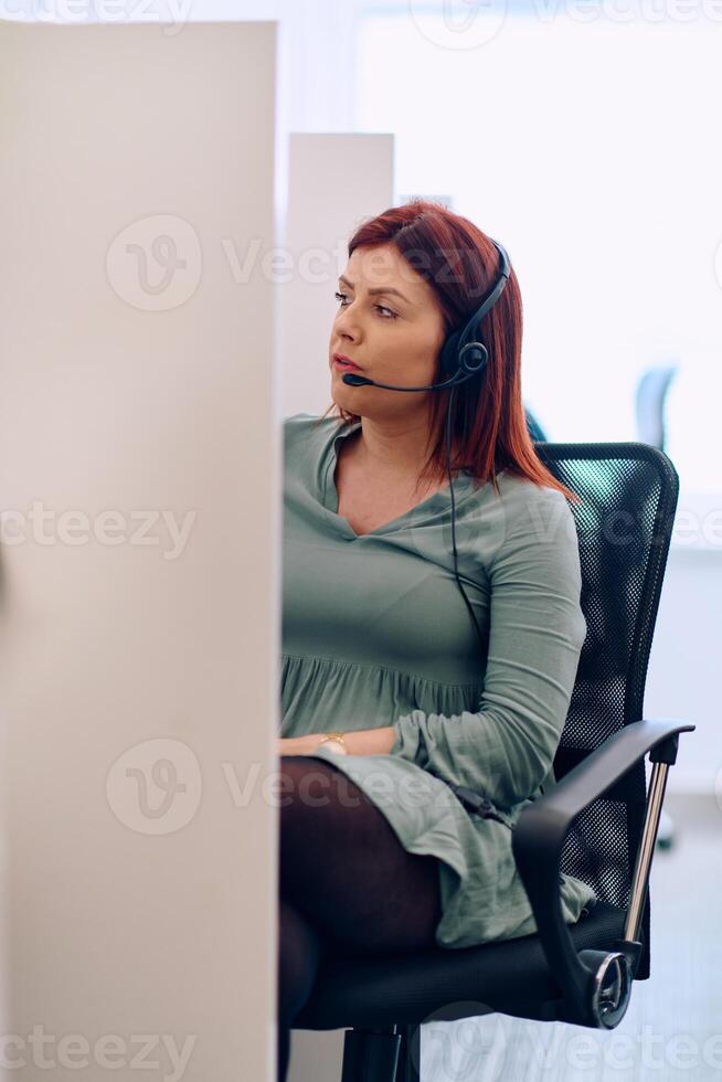 Female Call Center Agent Providing Customer Support and Assistance. photo