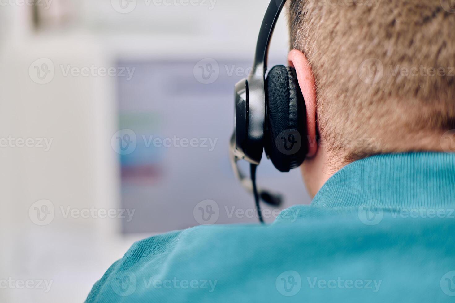 Close Up Portrait of a Customer Support Representative in a Call Center Environment. photo
