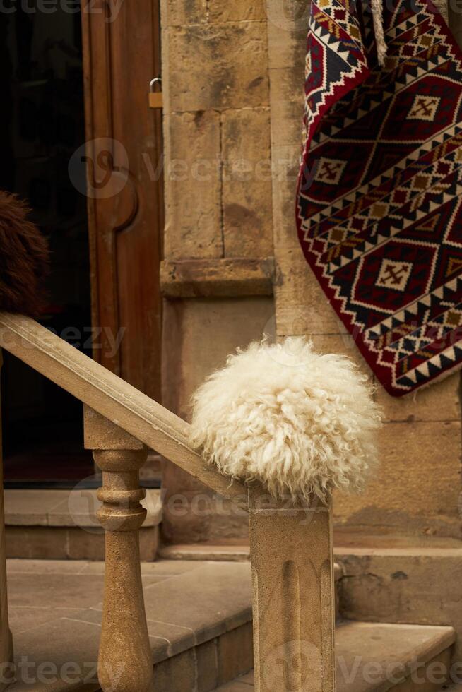 National carpets with Caucasian patterns are for sale in the old town photo