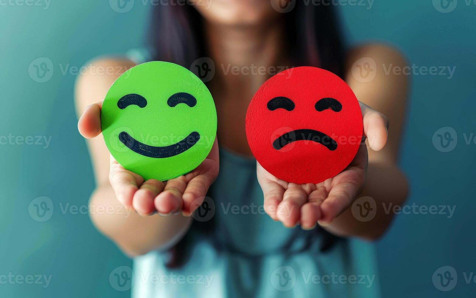 Contrasting Emotions Hands Holding Red and Green Sad Face Icons for Feedback and Customer Satisfaction. photo