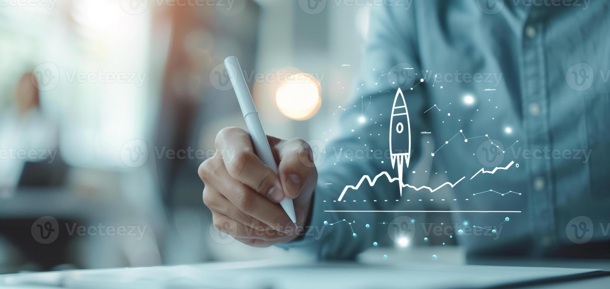 Businessman drawing a rocket signifying growth and success in business, symbolizing innovation and progress in a modern office setup. photo