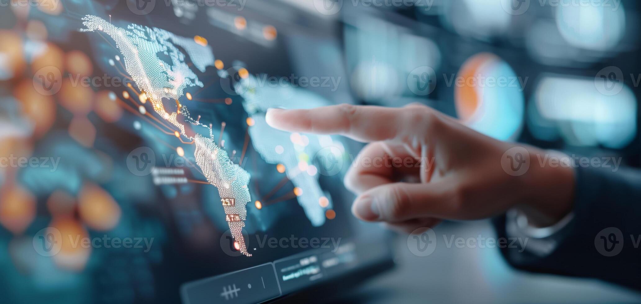 A person interacts with a digital world map on a touchscreen, showcasing technological and geographical exploration. photo