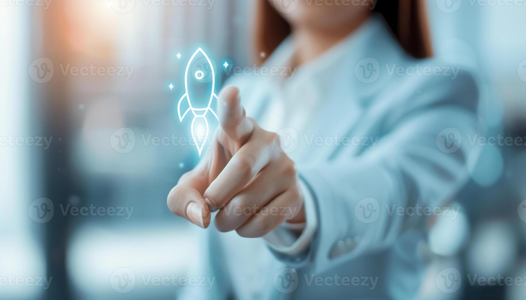 Businesswoman touching virtual rocket icon, representing innovation, startup, and technology. Business innovation and futuristic interface concept. photo