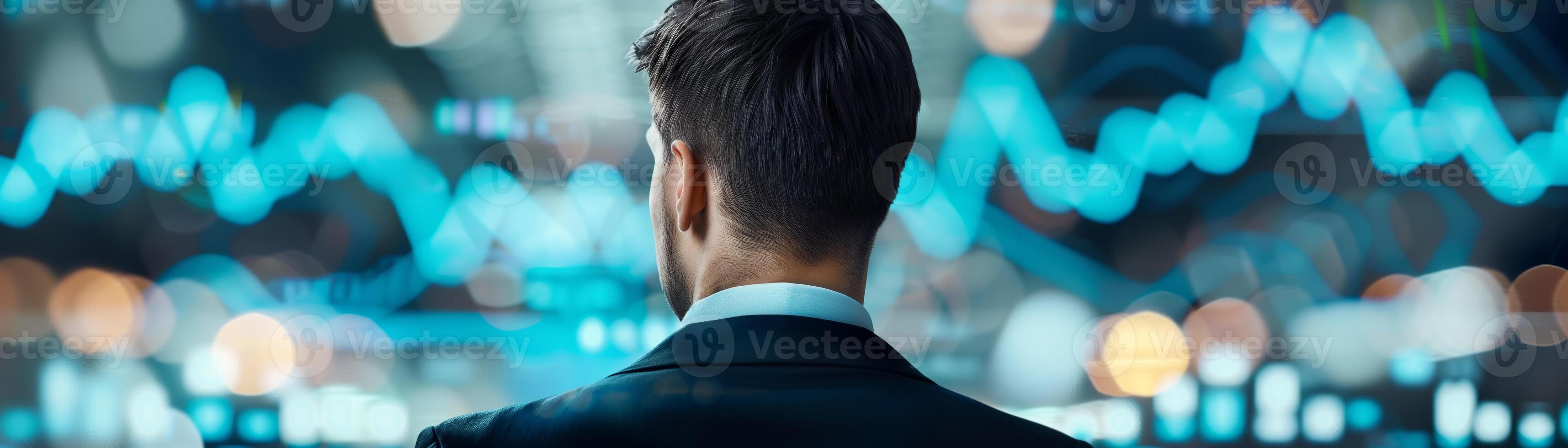 Businessman analyzing financial graphs on screens. Stock market data analysis. Business growth, strategy, and economic trends concept. photo