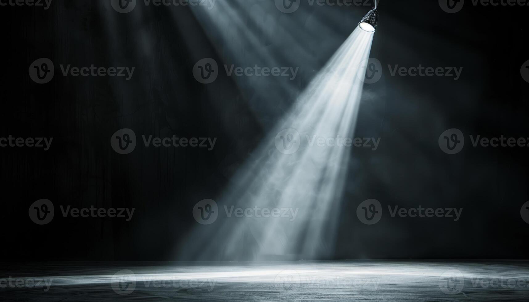 Dramatic spotlight illuminating an empty stage in a dark room, creating a moody and atmospheric scene perfect for theatrical or performance concepts. photo