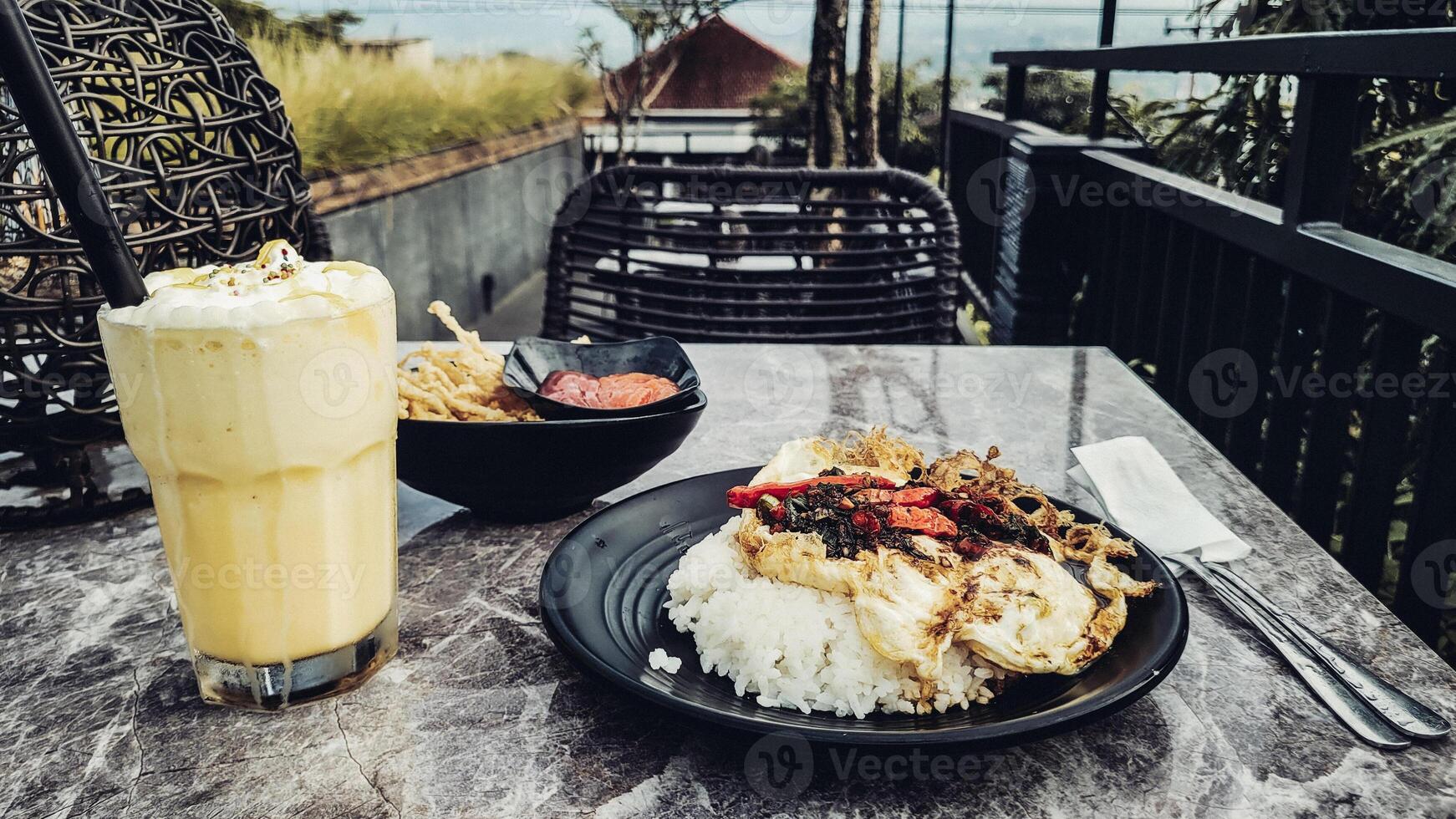 Pontianak egg rice with banana shake and enoki crispy mushroom photo
