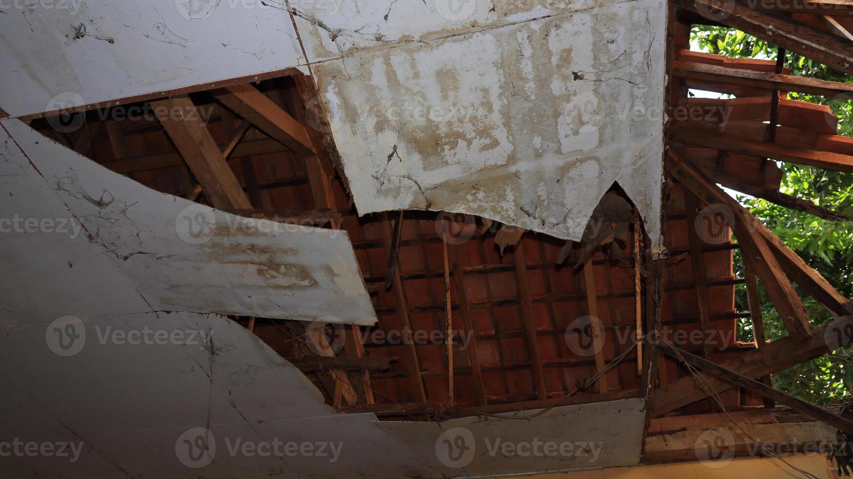The roof of the house has collapsed photo