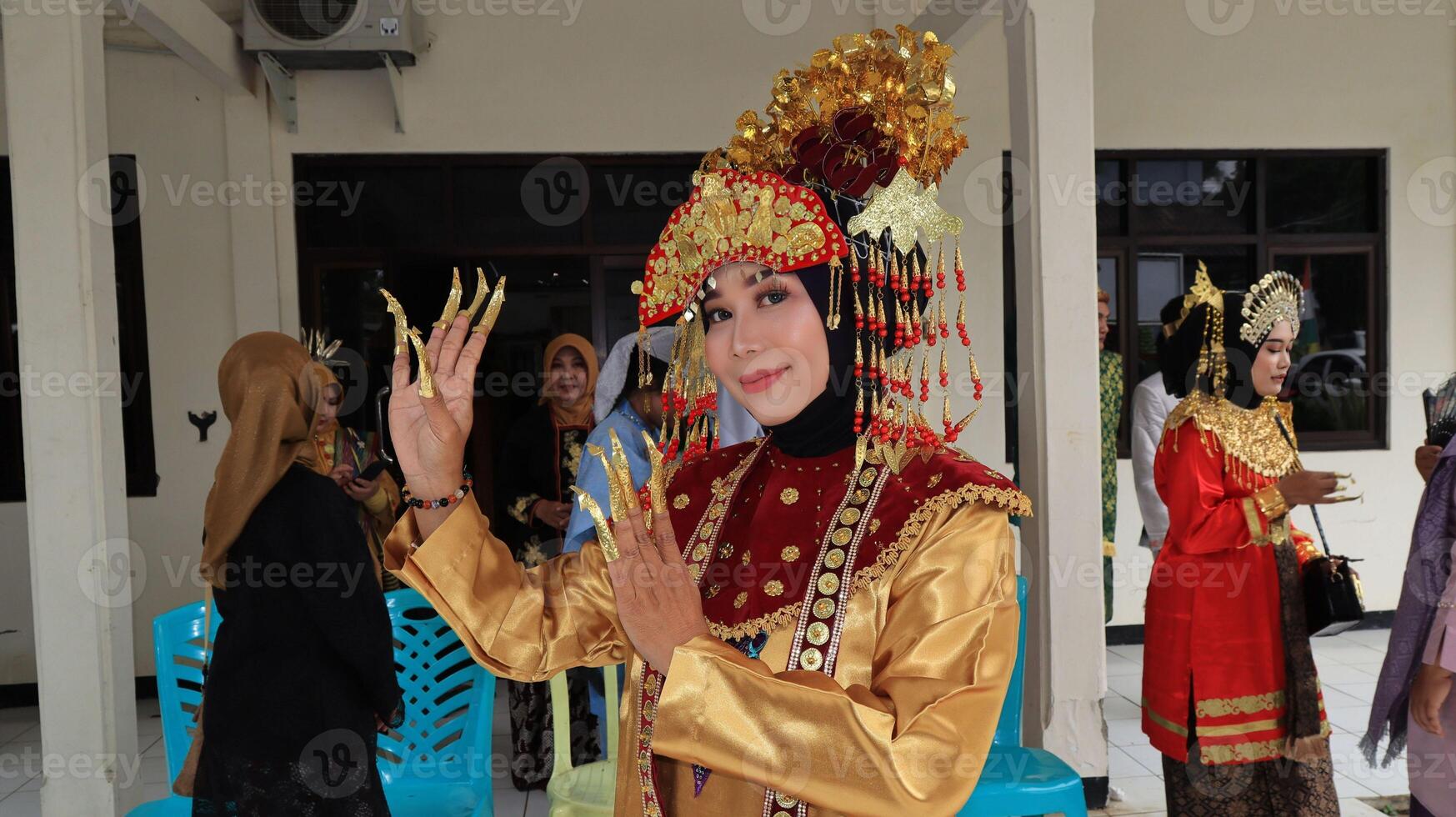 Community cultural parade with various unique and traditional costumes photo