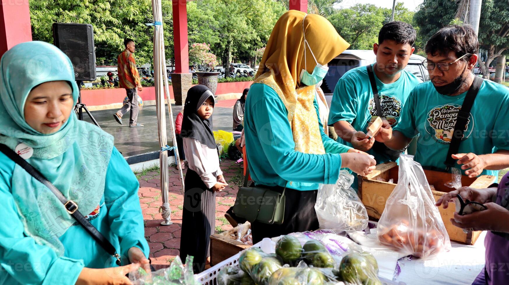Portrait of residents shopping for groceries at a traditional shopping place photo