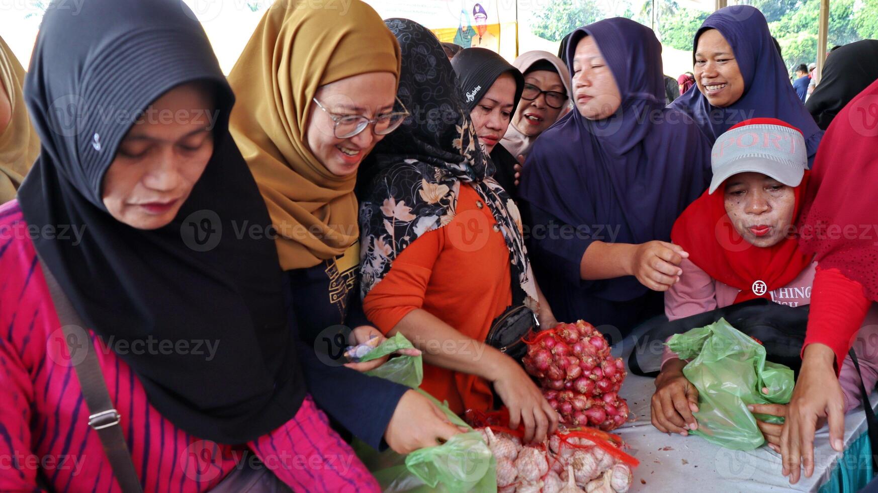 Portrait of residents shopping for groceries at a traditional shopping place photo
