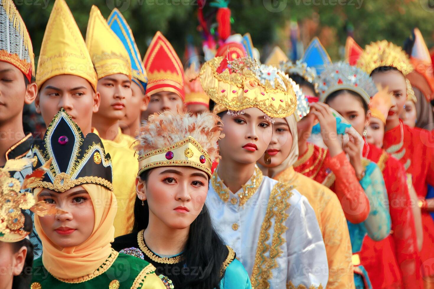 Parade Indonesia traditional cultural costumes by young people photo