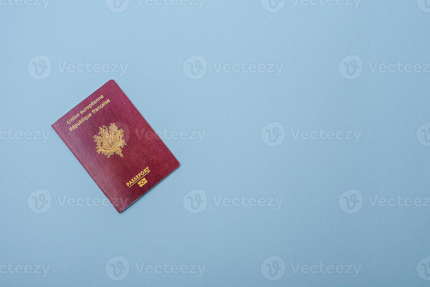 Passport of the Republic of France on a blue background photo