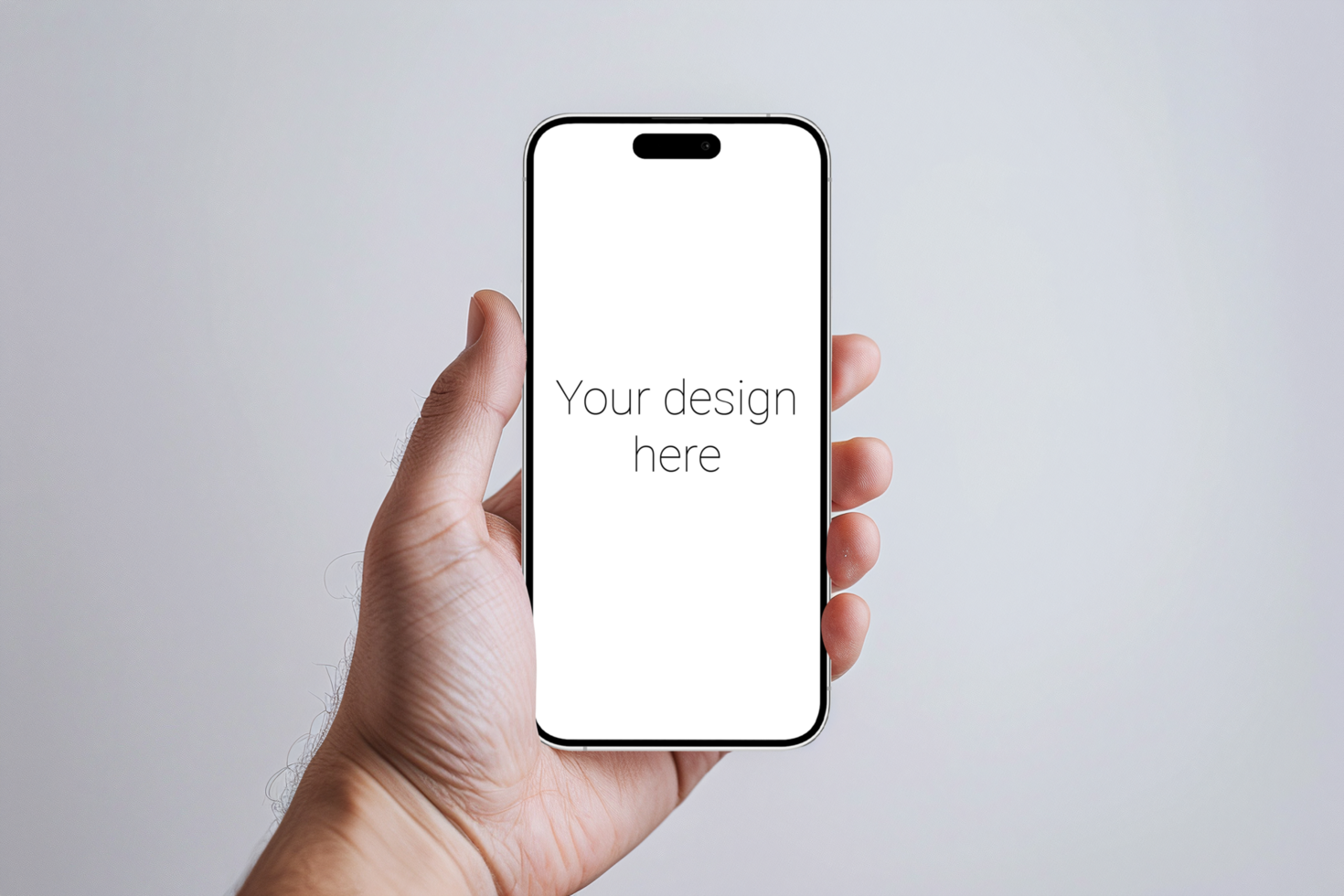 Mockup of white smartphone similar to iphone in person's hand. Gray wall on background psd