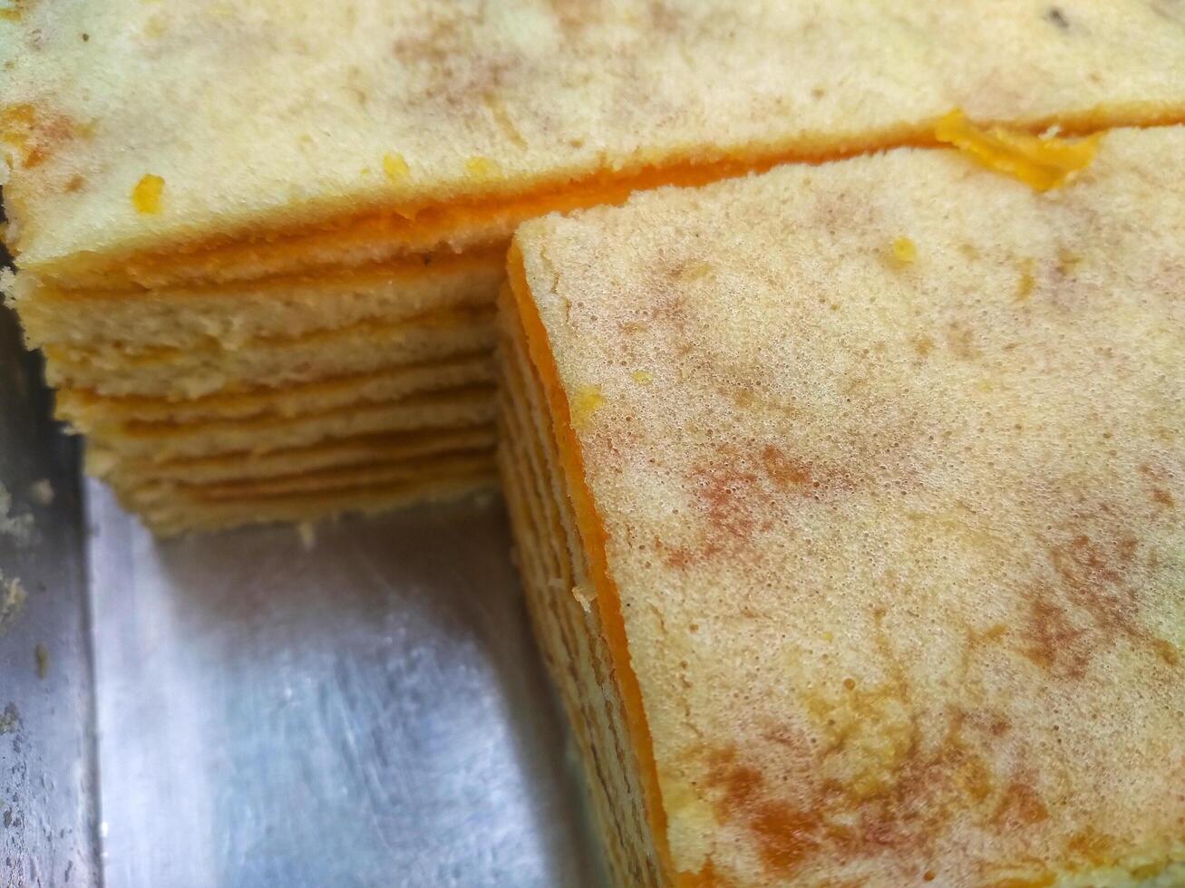 Kue Lapis or Kue Pepe or Rainbow sticky layer cake, Indonesian traditional dessert made from rice flour and coconut milk, steamed layer by layer photo
