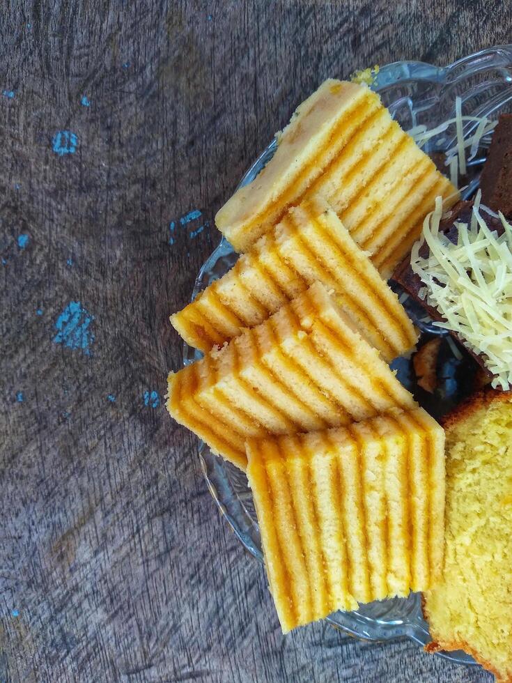 Kue Lapis or Kue Pepe or Rainbow sticky layer cake, Indonesian traditional dessert made from rice flour and coconut milk, steamed layer by layer photo