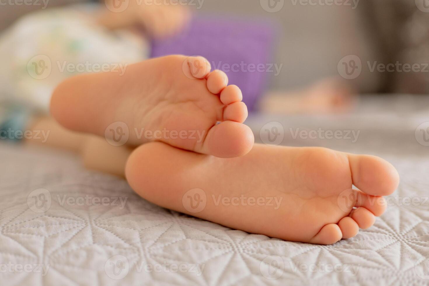 Close-up view of kid's feet. Child foot care, hygiene, correct footwear. Flat feet. Ideal for use in healthcare, pediatrics, and parenting-themed projects or advertisements. Foot problems, pain. photo