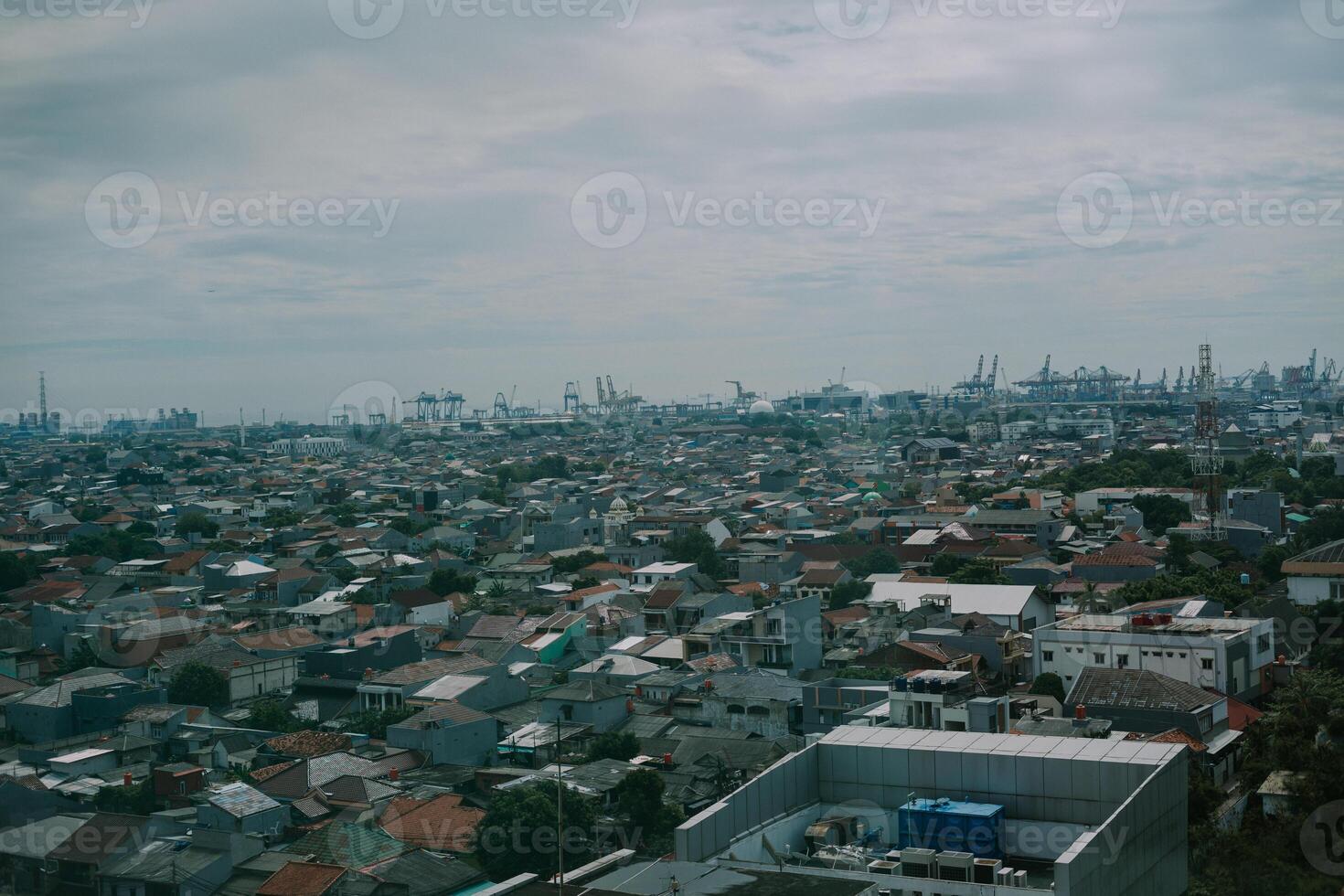 Jakarta city view captured from a rooftop perspective photo