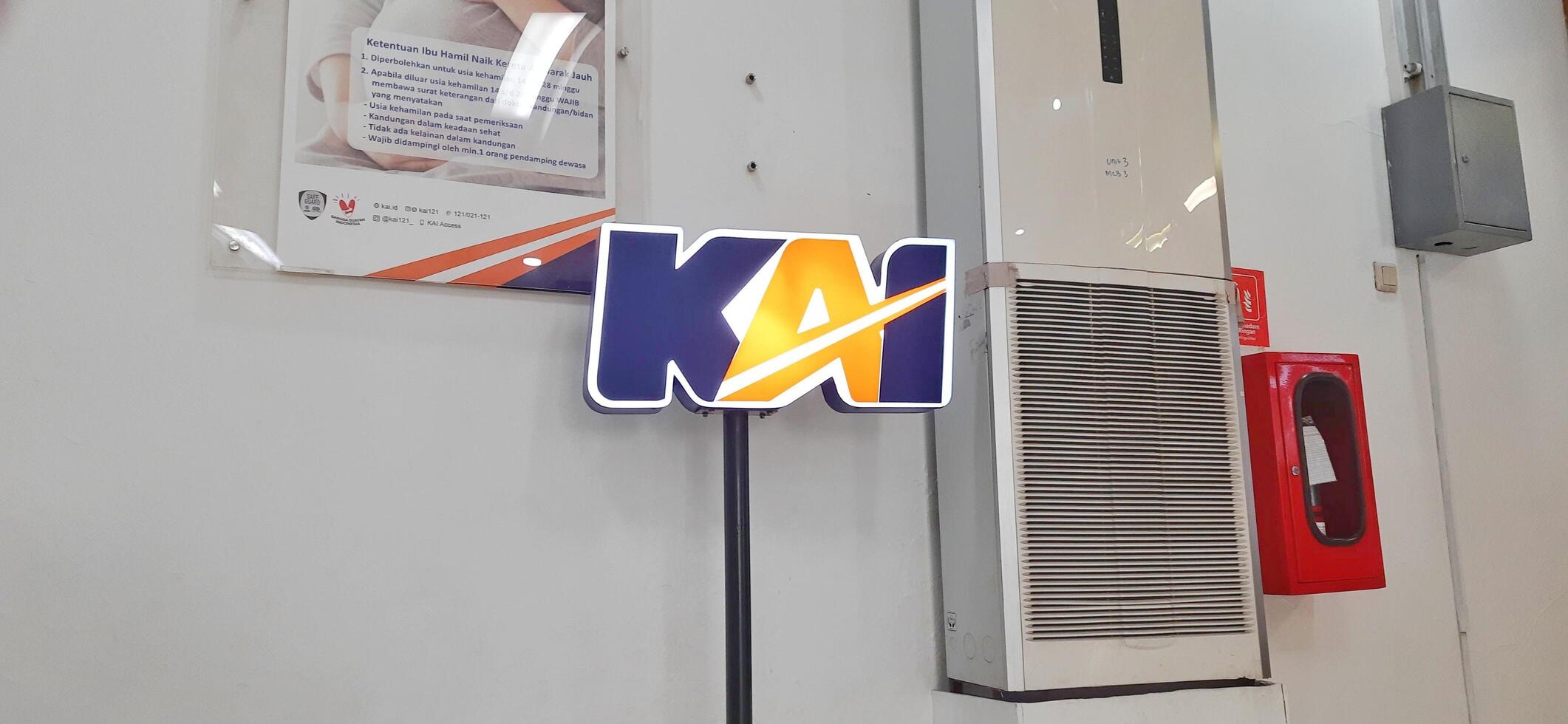 Customer service queue activity for registration of reduced Indonesian train ticket rates for the elderly in the Pasar Senen train station area. Jakarta, Indonesia - June 8, 2024 photo