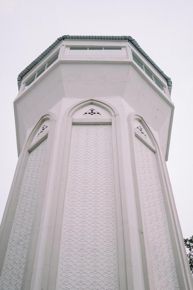 Bogor, Juy 21 2024. The minaret of the Great Mosque of Bogor rises majestically, showcasing intricate architecture and spiritual significance. photo