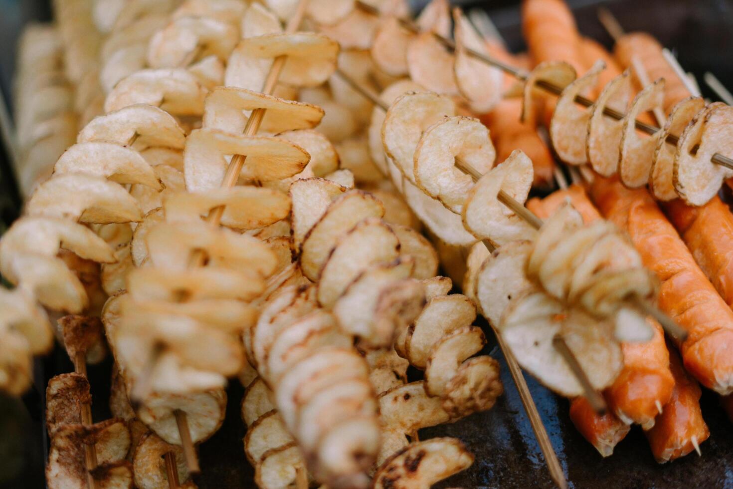 Skewered crispy chips, a delightful snack with a crunchy texture, perfect for enjoying a savory treat on the go photo