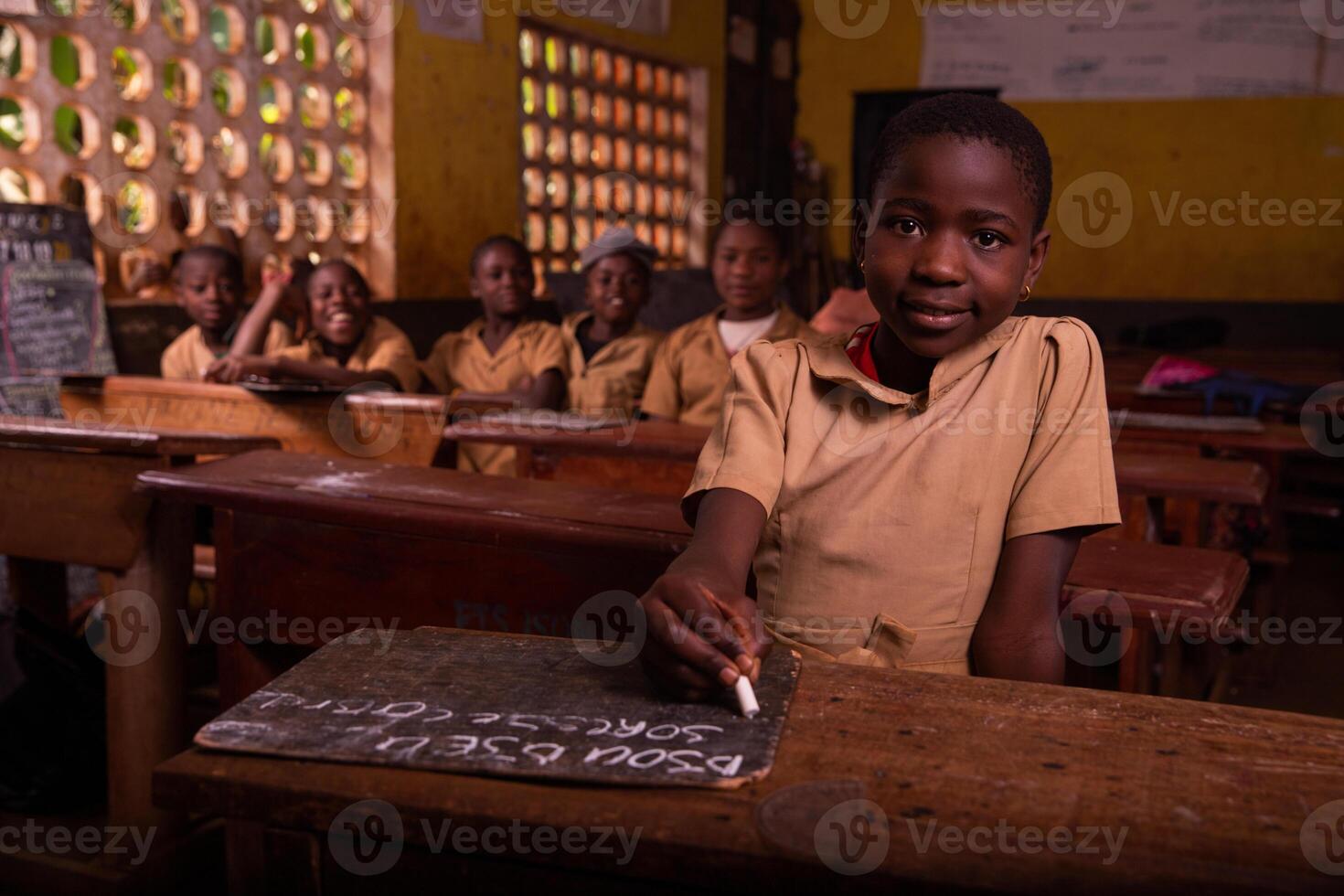 In an african classroom full of black children intent on learning. Learning concept photo