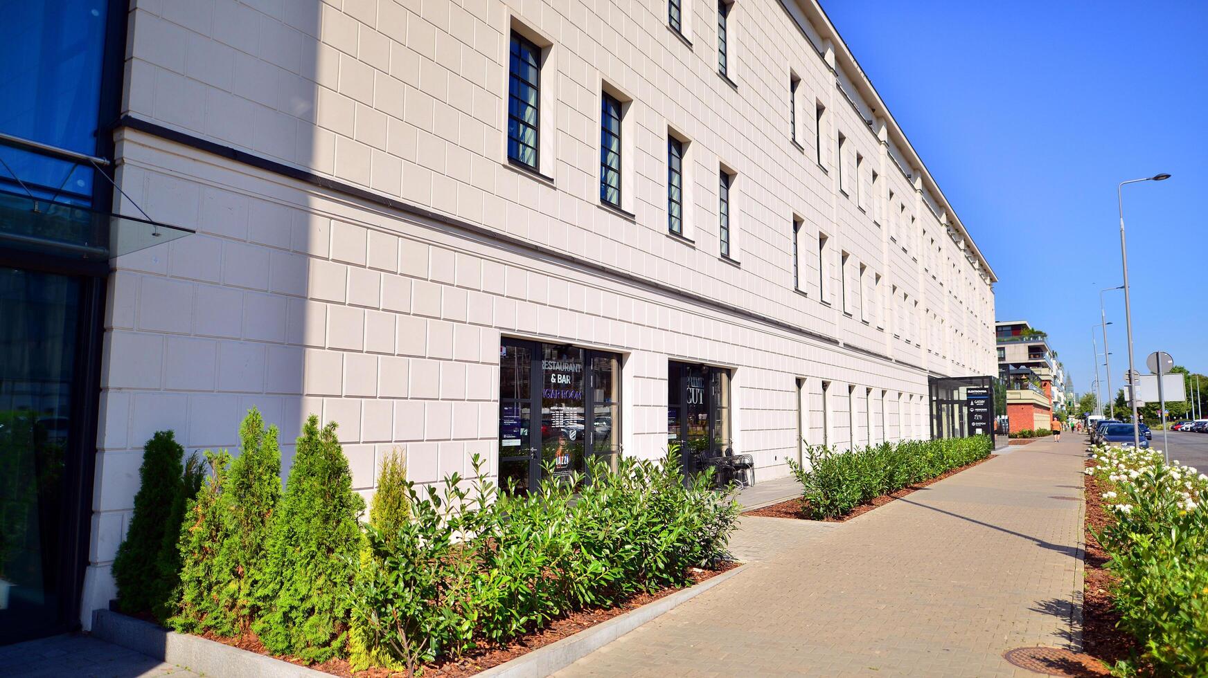 Warsaw, Poland. 9 July 2024. View of building of the Elektrownia Powisle. A revitalized former factory building. The history of the Powisle Power Plant is over 100 years old. photo