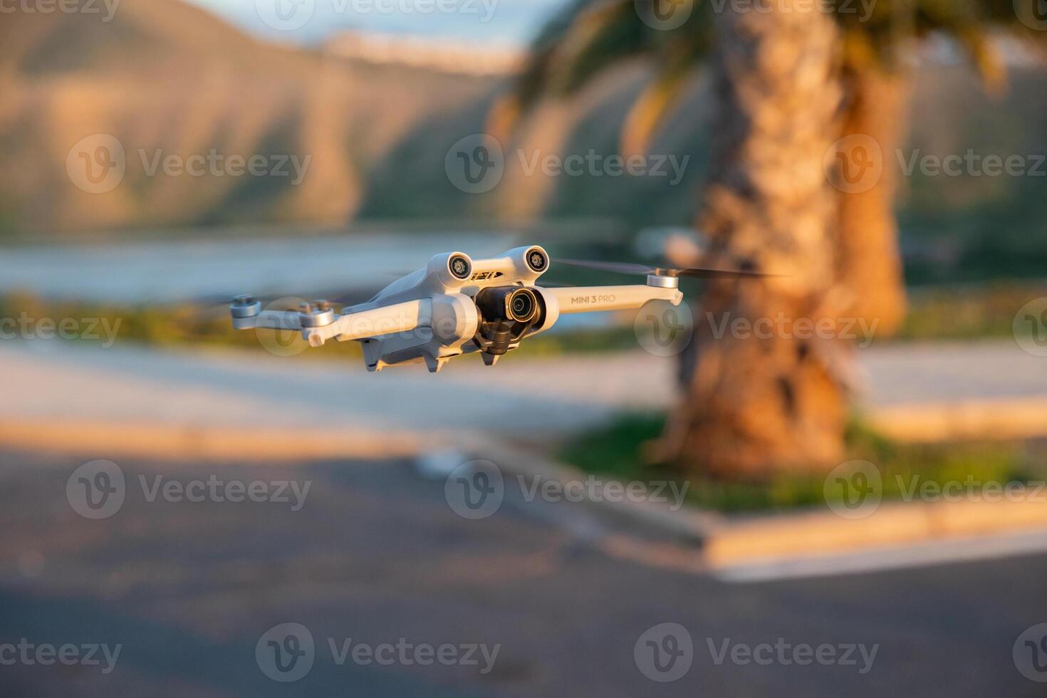 A DJI Mini 3 Pro drone in flight, DJI's new lightweight drone. photo