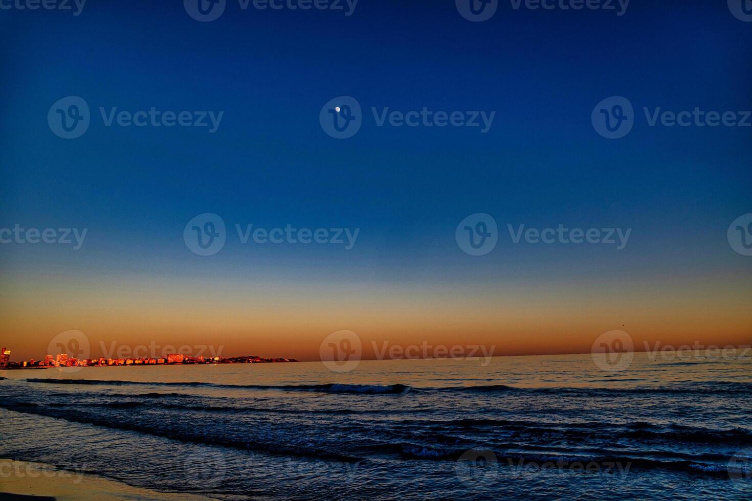 playa del postiguet alicante spain after sunset photo