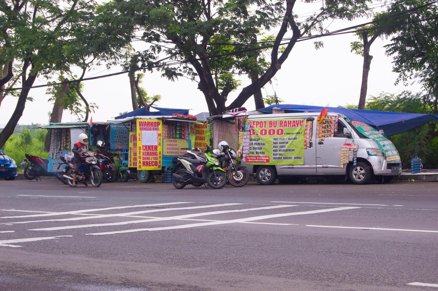 surabaya, indonesia, 2023 - view of street food vendors in surabaya indonesia photo