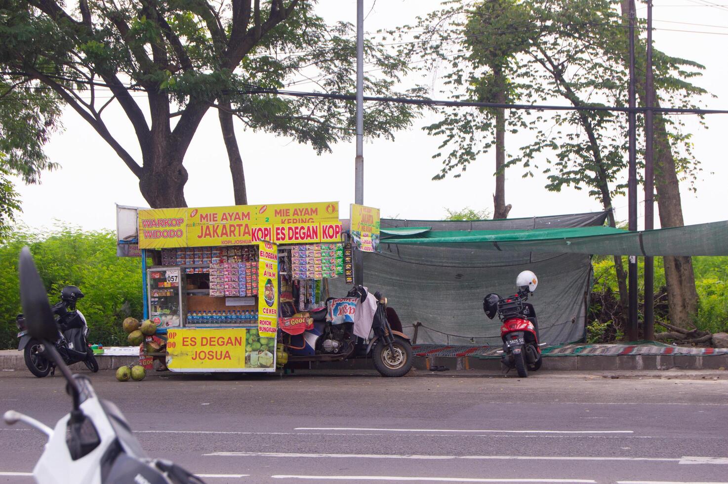 surabaya, indonesia, 20 may 2023 - view of street food vendors in surabaya indonesia photo