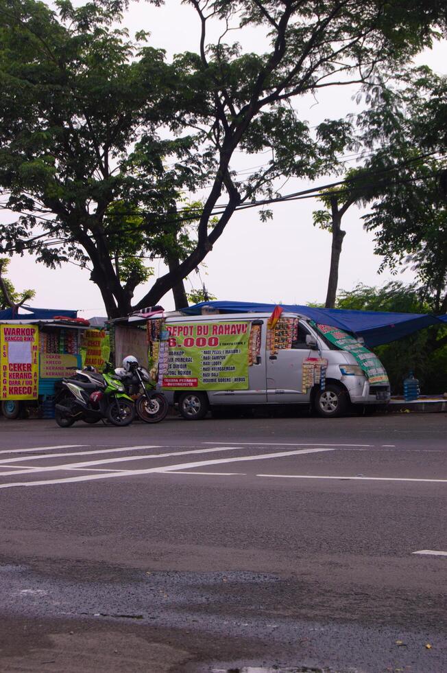 surabaya, indonesia, 20 may 2023 - view of street food vendors in surabaya indonesia photo