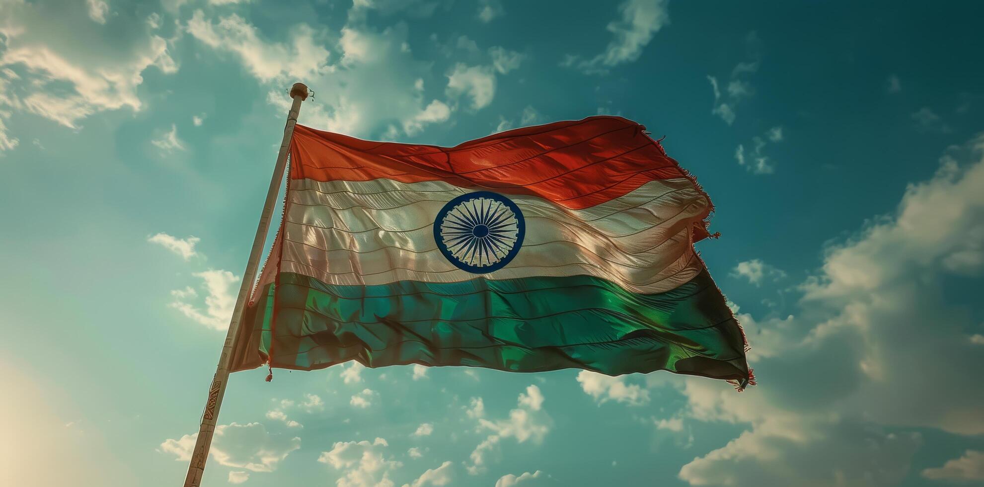 Indian Flag Waving in the Wind at Sunset photo