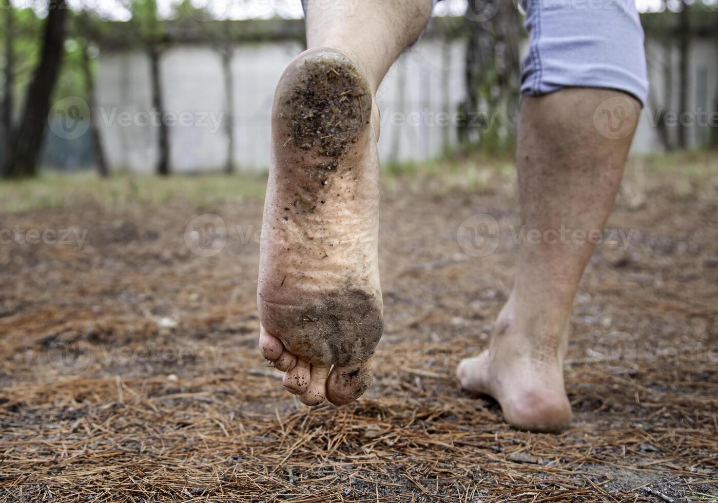 Dirty feet with mud photo