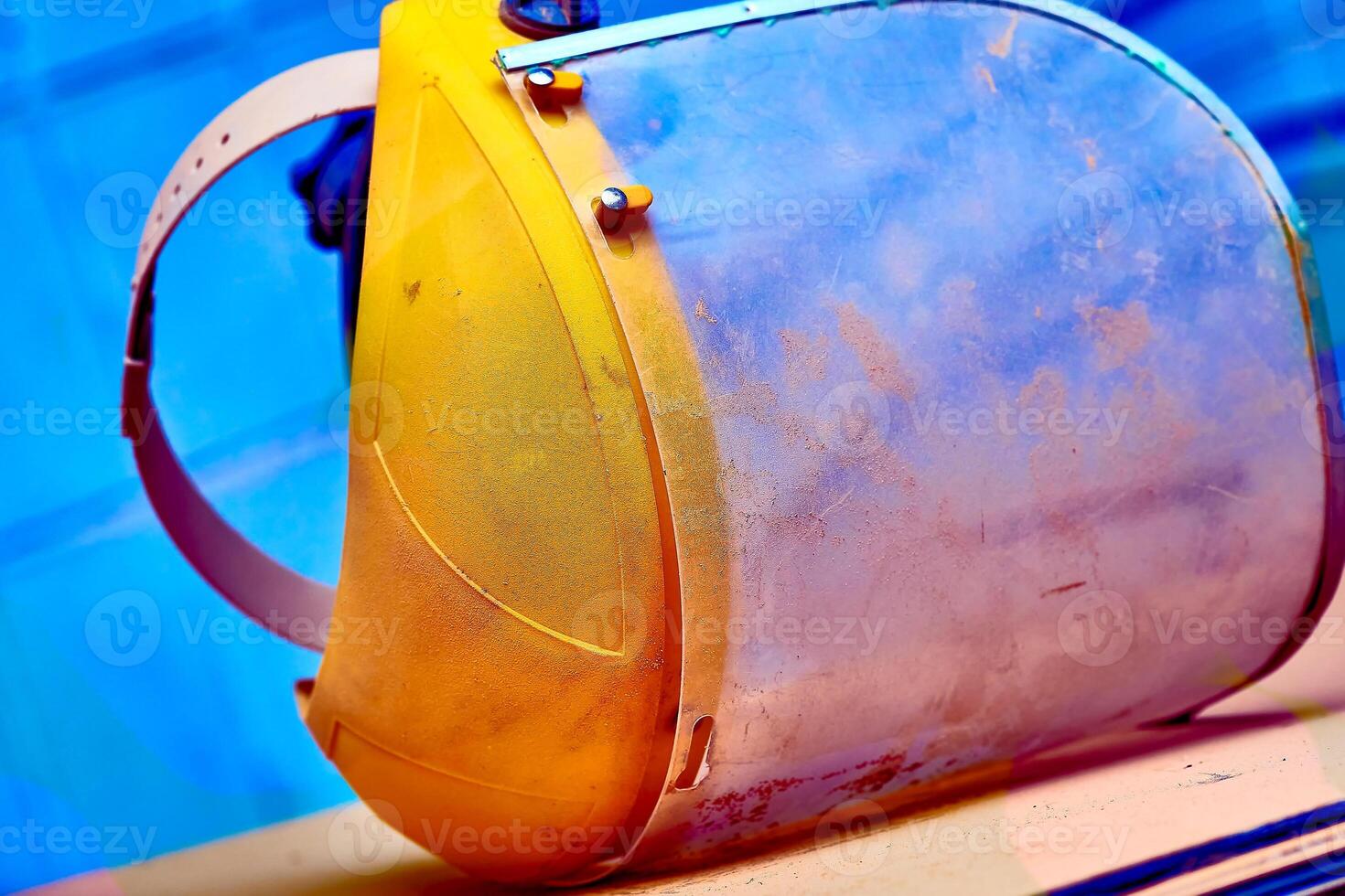 Plastic protective mask for working on metal, wood, construction, cleaning photo