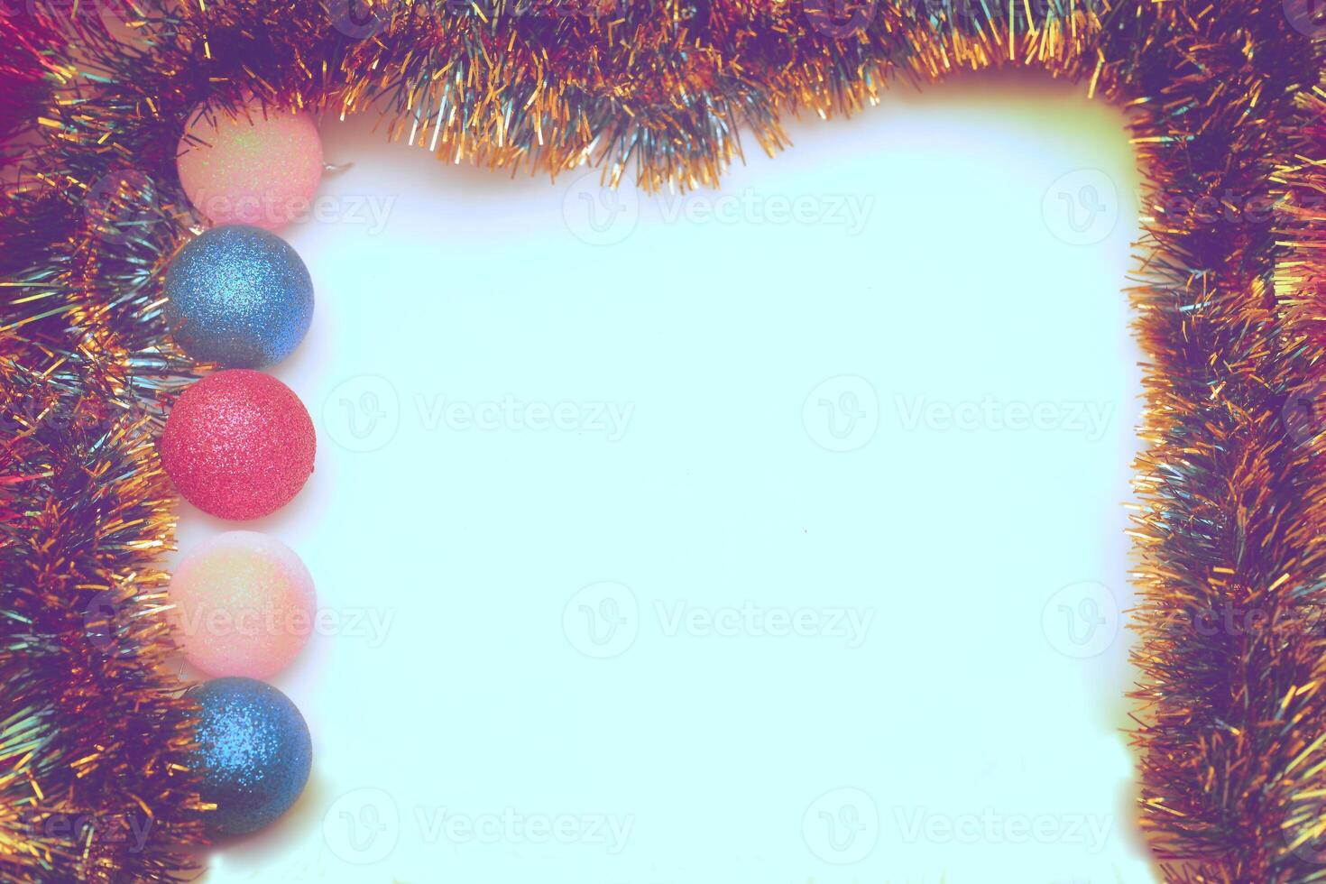 New Year's Christmas background with toys, balls, garlands, tree snowy rain photo