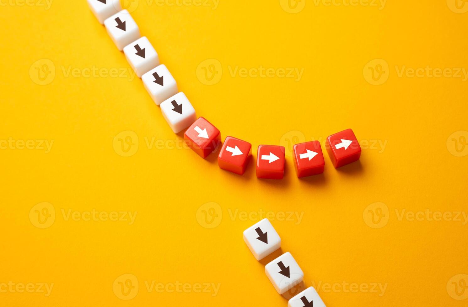 The path of the arrows deviates from the main path. Go off the road, deviate from the course. Take the risk of changing the movement and course of events. photo