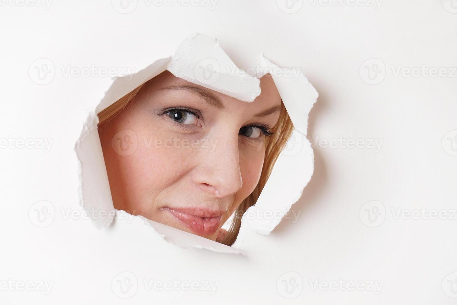 young woman peeking photo