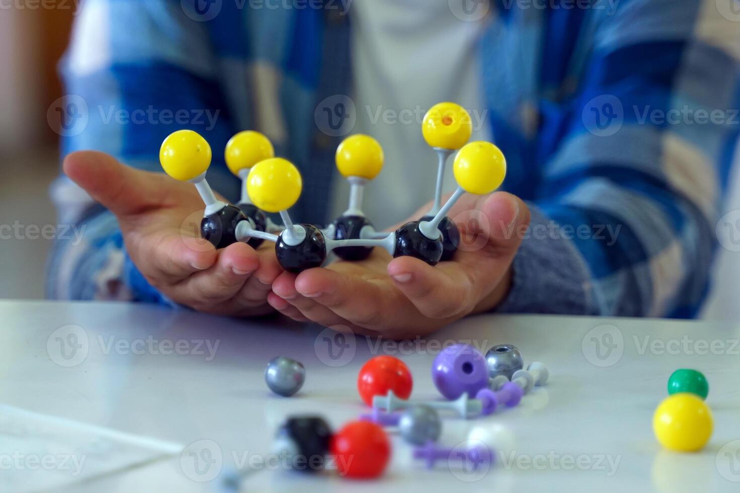 Students build a Shape of covalent molecule model during chemistry class. Concept of chemistry, chemistry experiment, chemistry classroom, science photo