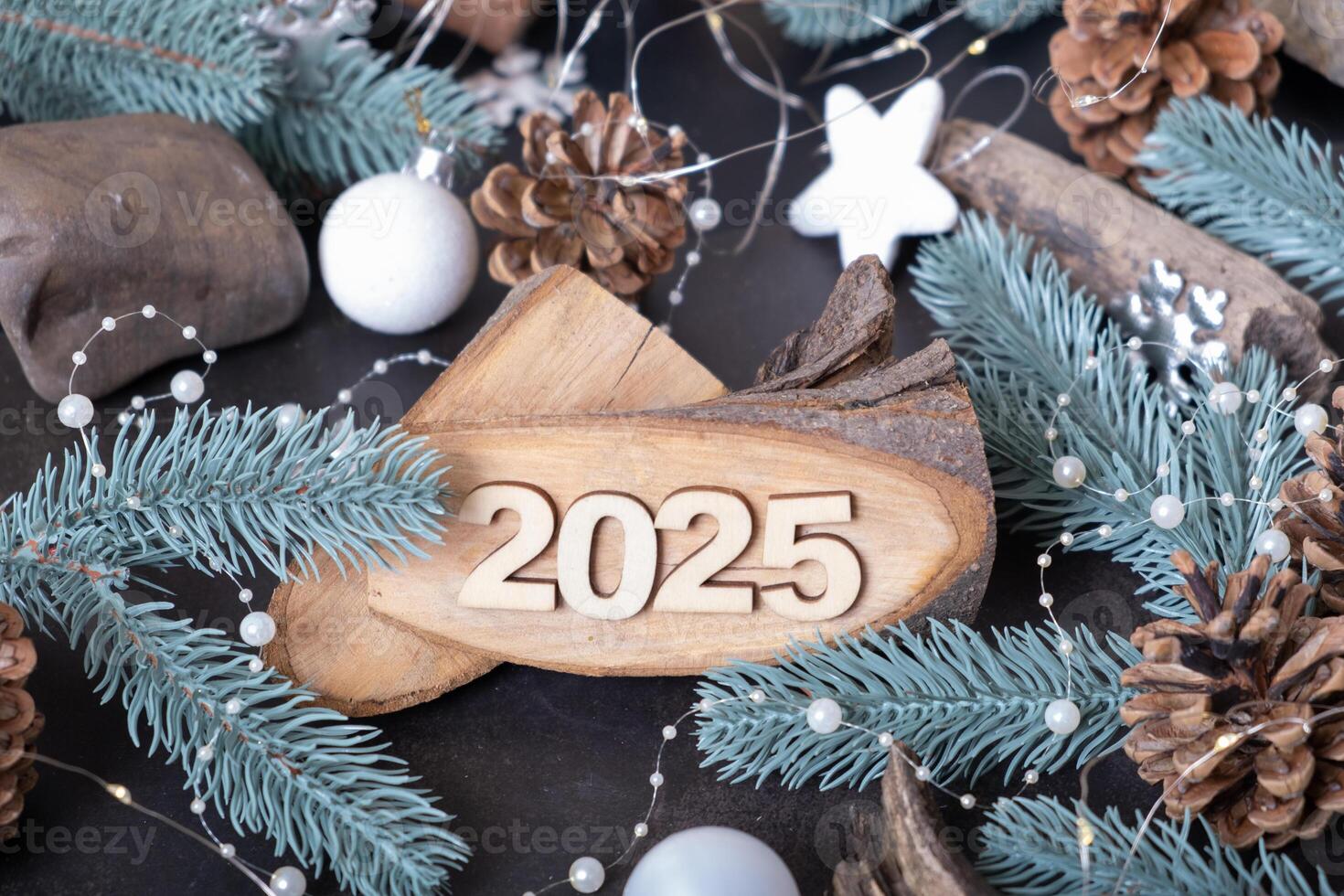 Numbers New Year 2025 on wooden backgrounds with winter decorations photo