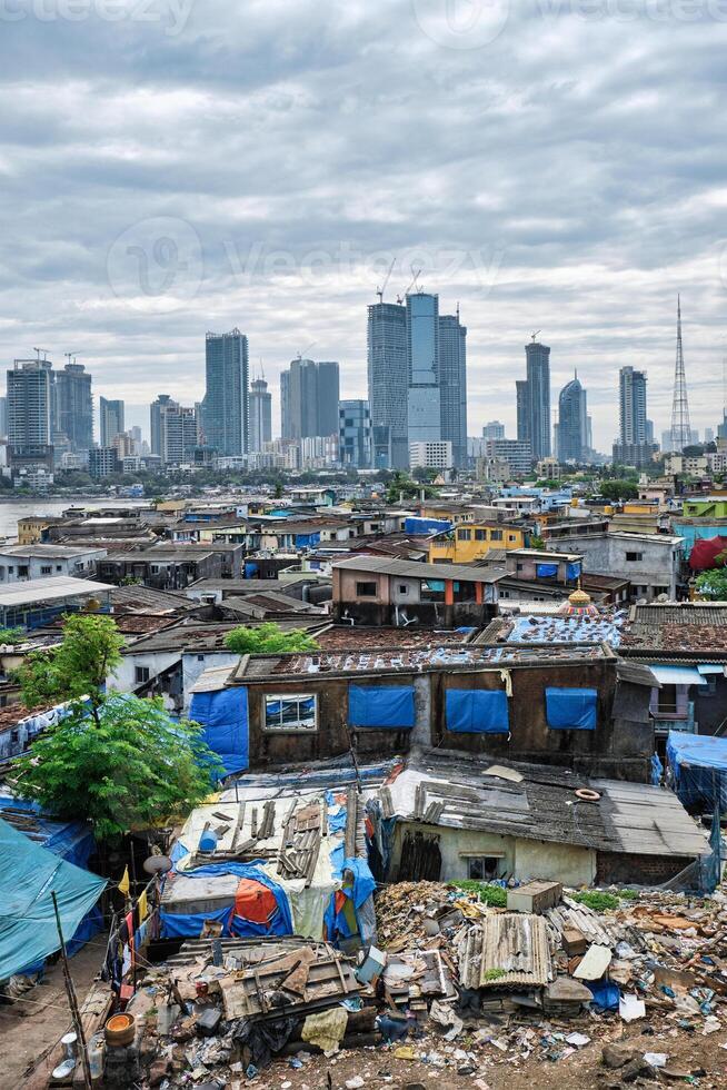 View of Mumbai skyline over slums in Bandra suburb photo