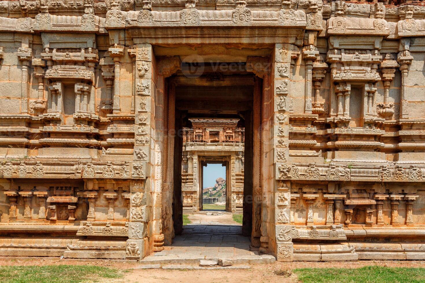 Gate in temple gopuram. Ruins in Hampi, Karnataka, India photo