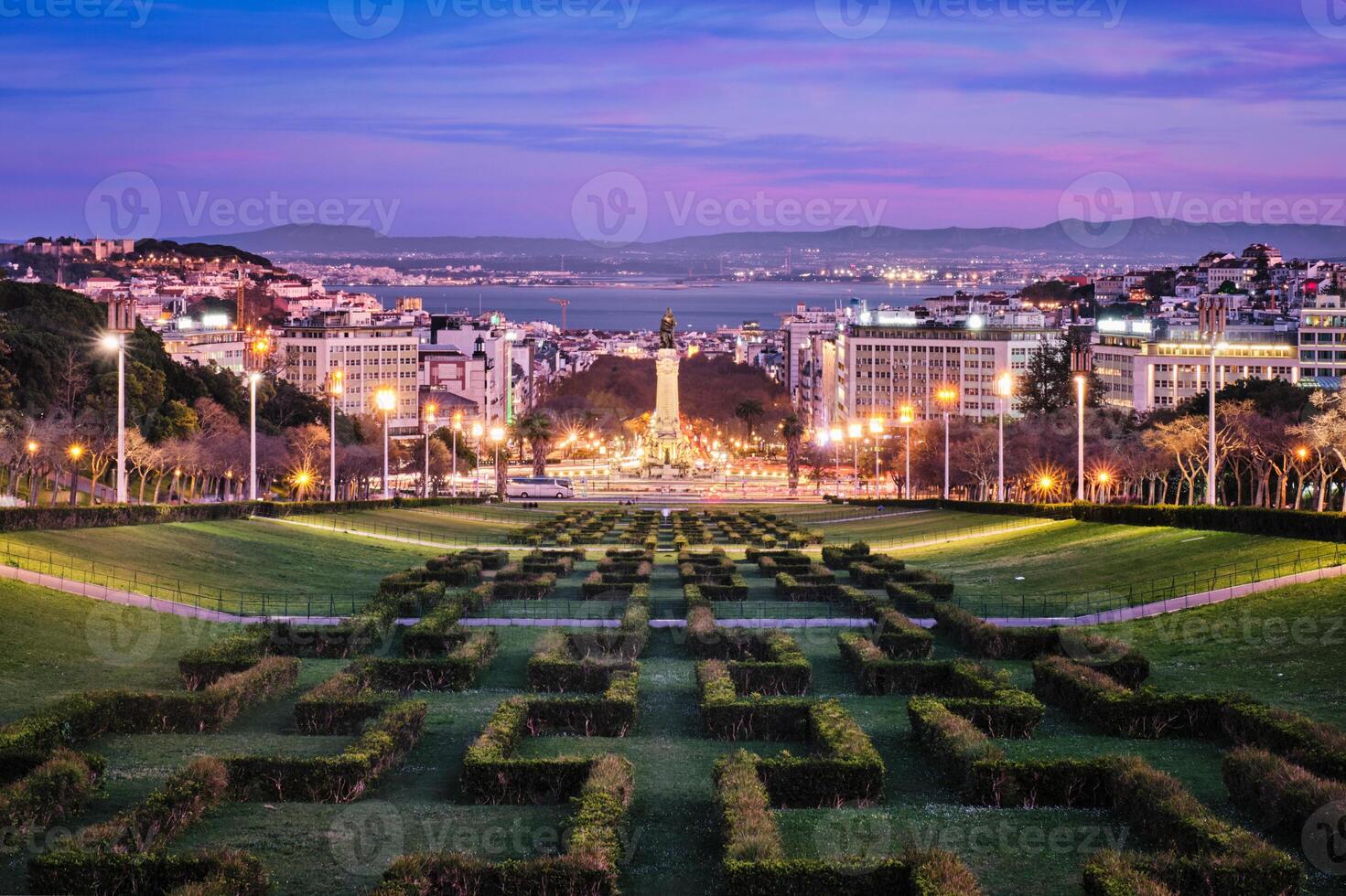 View of Lisbon Marquis of Pombal Square seen from the Eduardo VII Park in night, Portugal photo