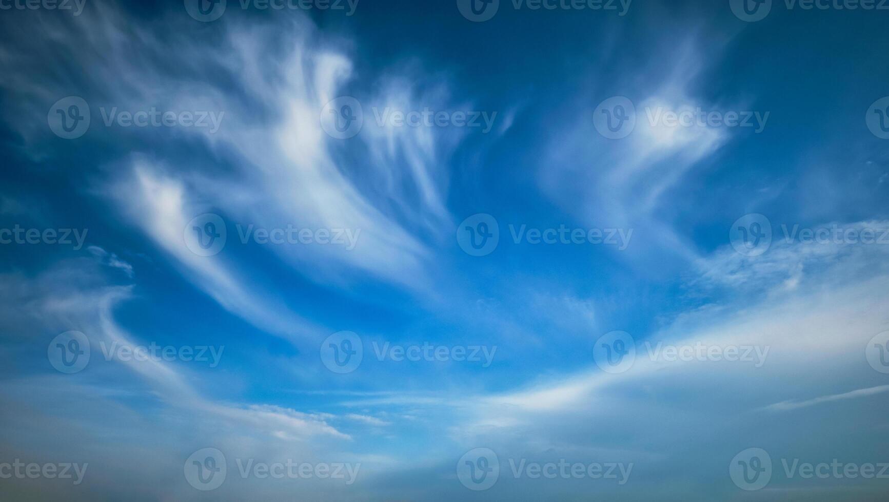 Blue sky with whie Cirrus clouds photo
