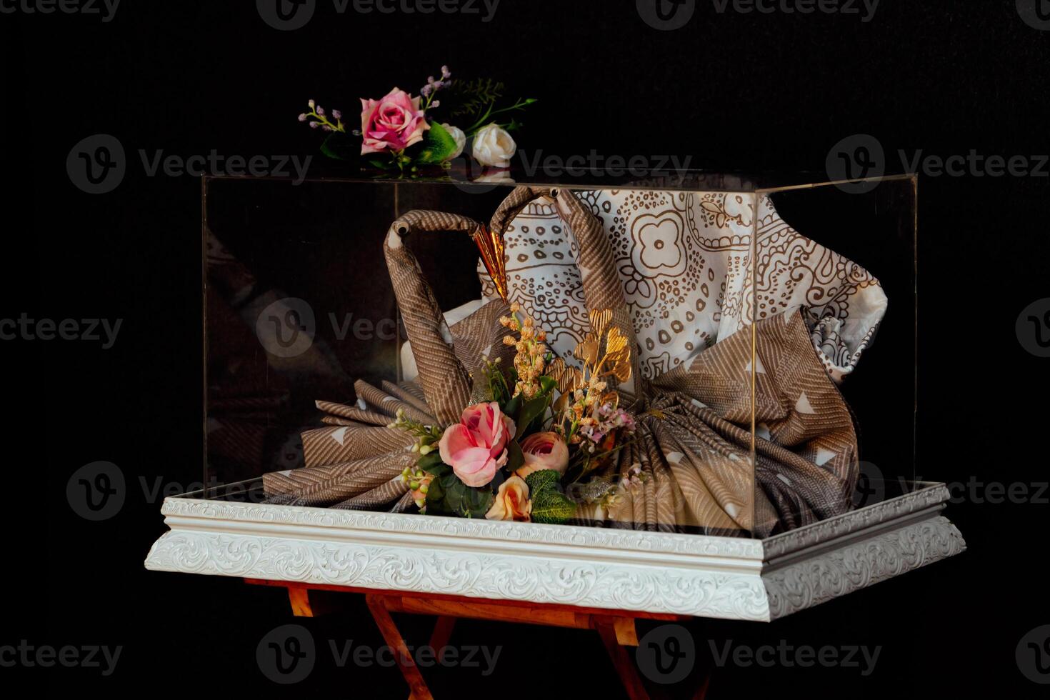 Wedding gift box given by the groom to the bride in Indonesian culture which contains various kinds of daily necessities that are decorated beautifully and attractively photo