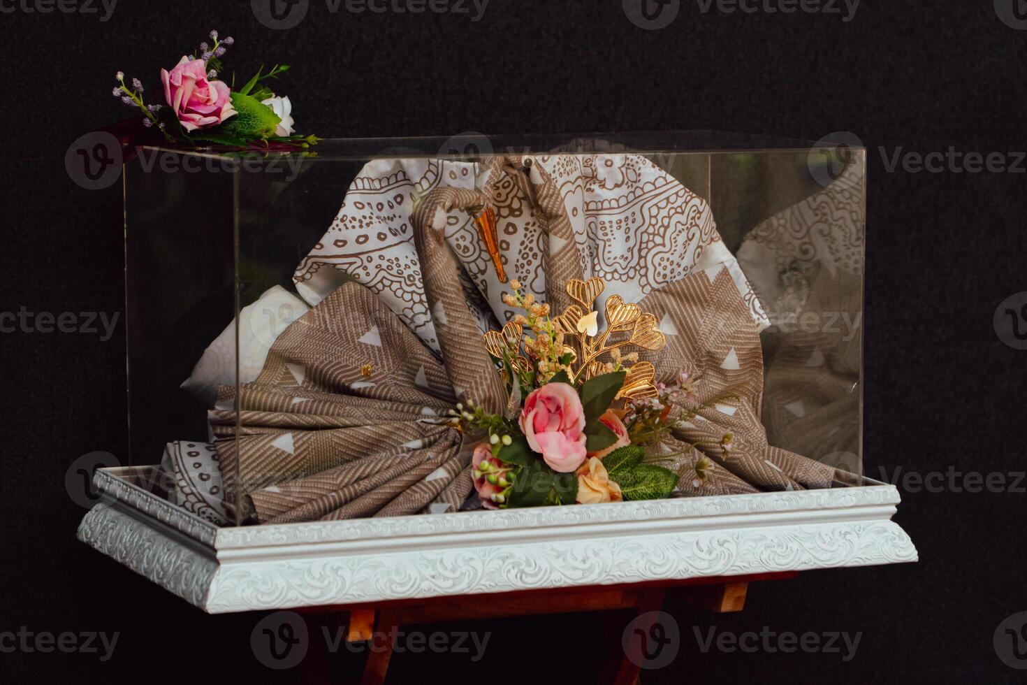 Wedding gift box given by the groom to the bride in Indonesian culture which contains various kinds of daily necessities that are decorated beautifully and attractively photo