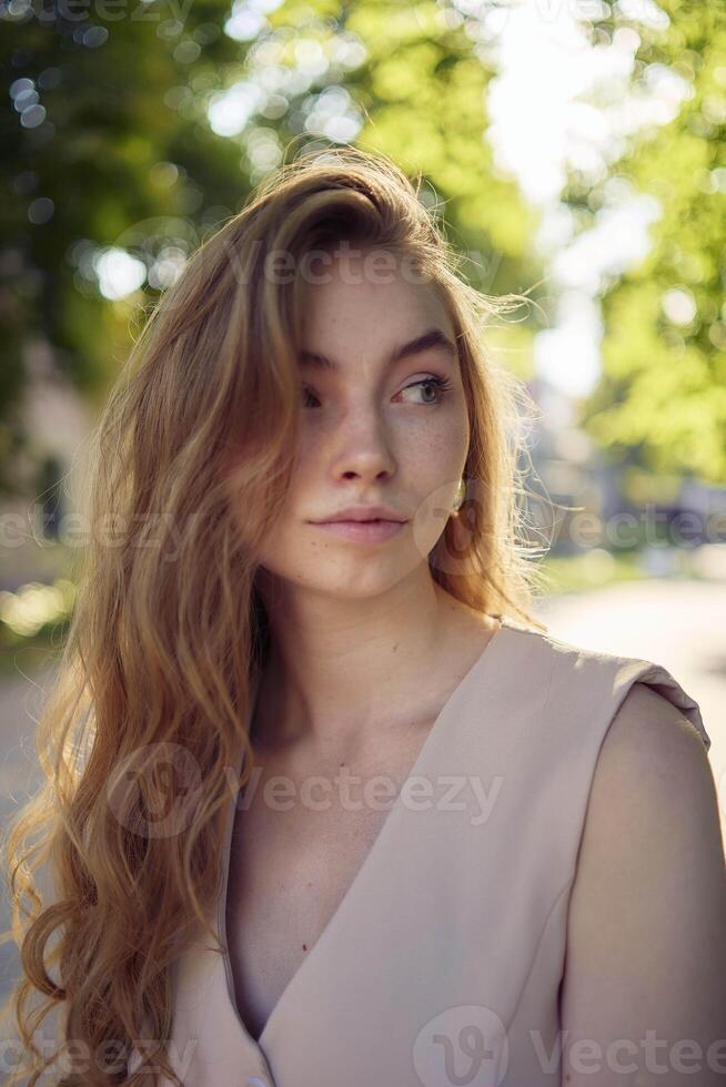 a beautiful teenage girl in a peach fuzz suit with a waistcoat, in the style of old money walks through the morning city photo