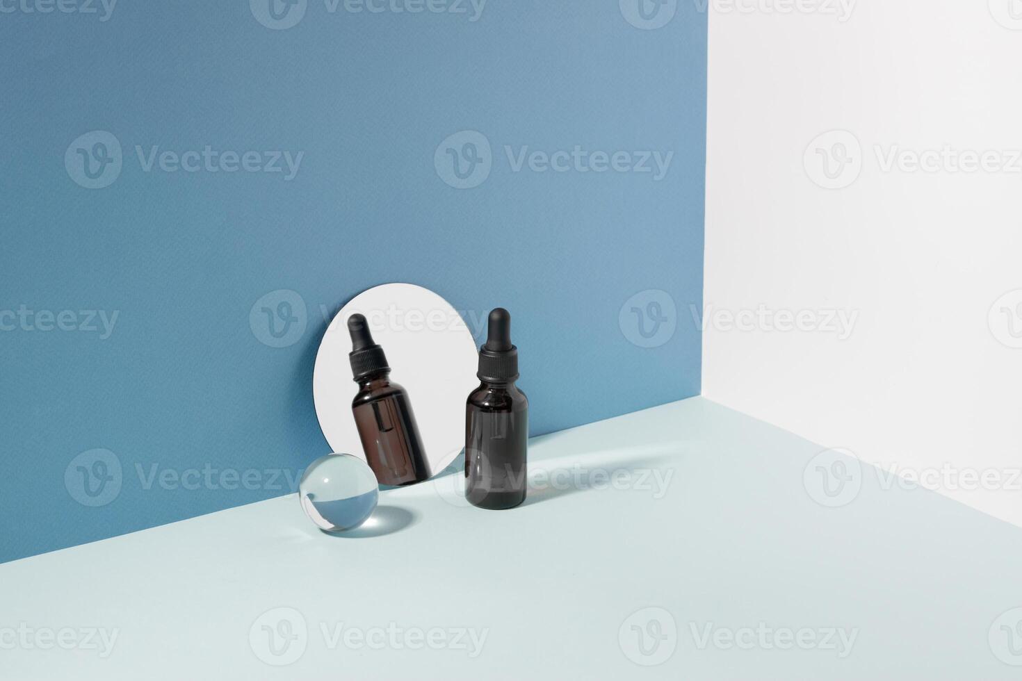 Cosmetic bottle pipette minimalist background, reflected in the mirror, background hard sunlight photo