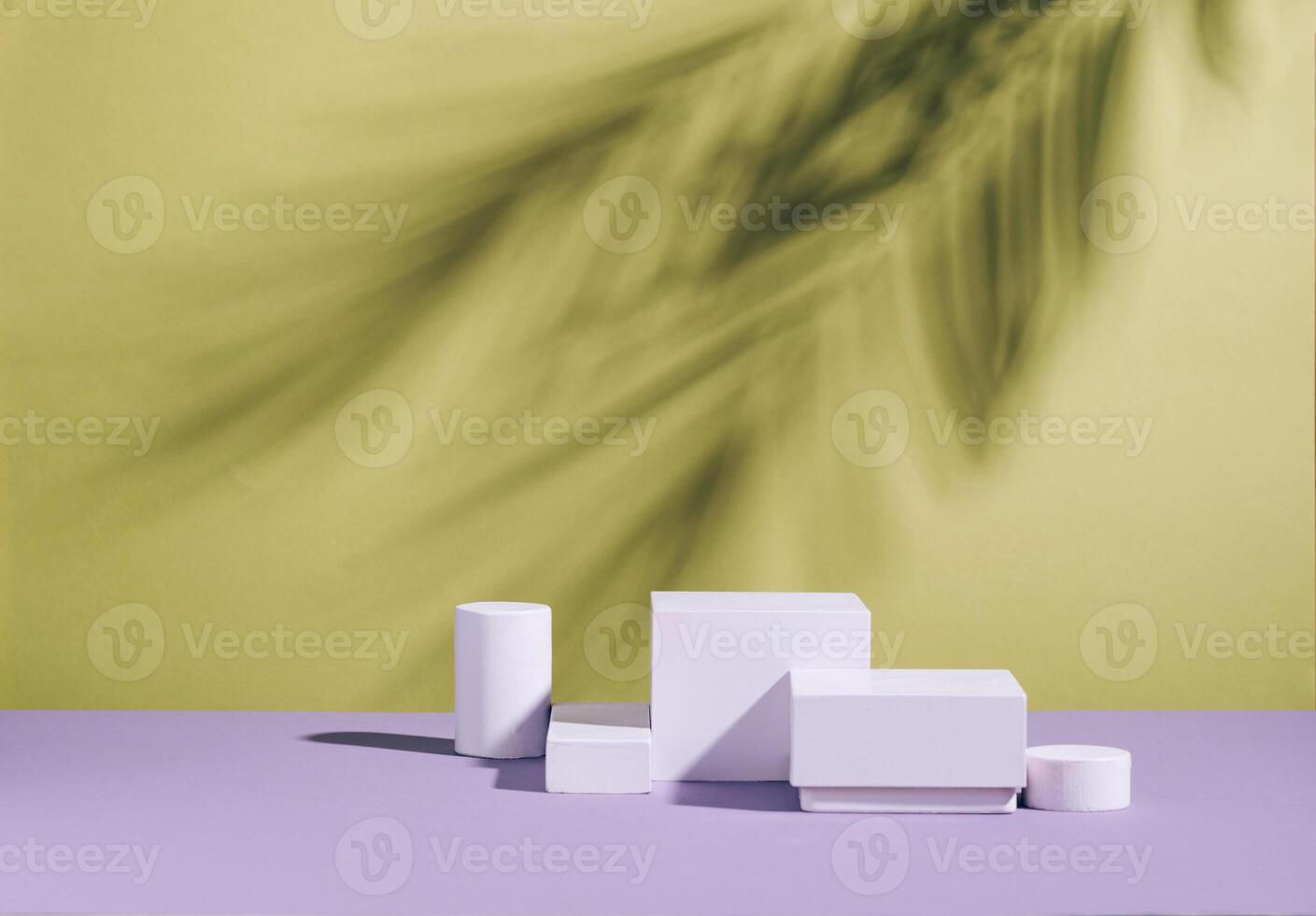Abstract podium pedestal made white marble colorful bright empty background hard shadows from plant photo