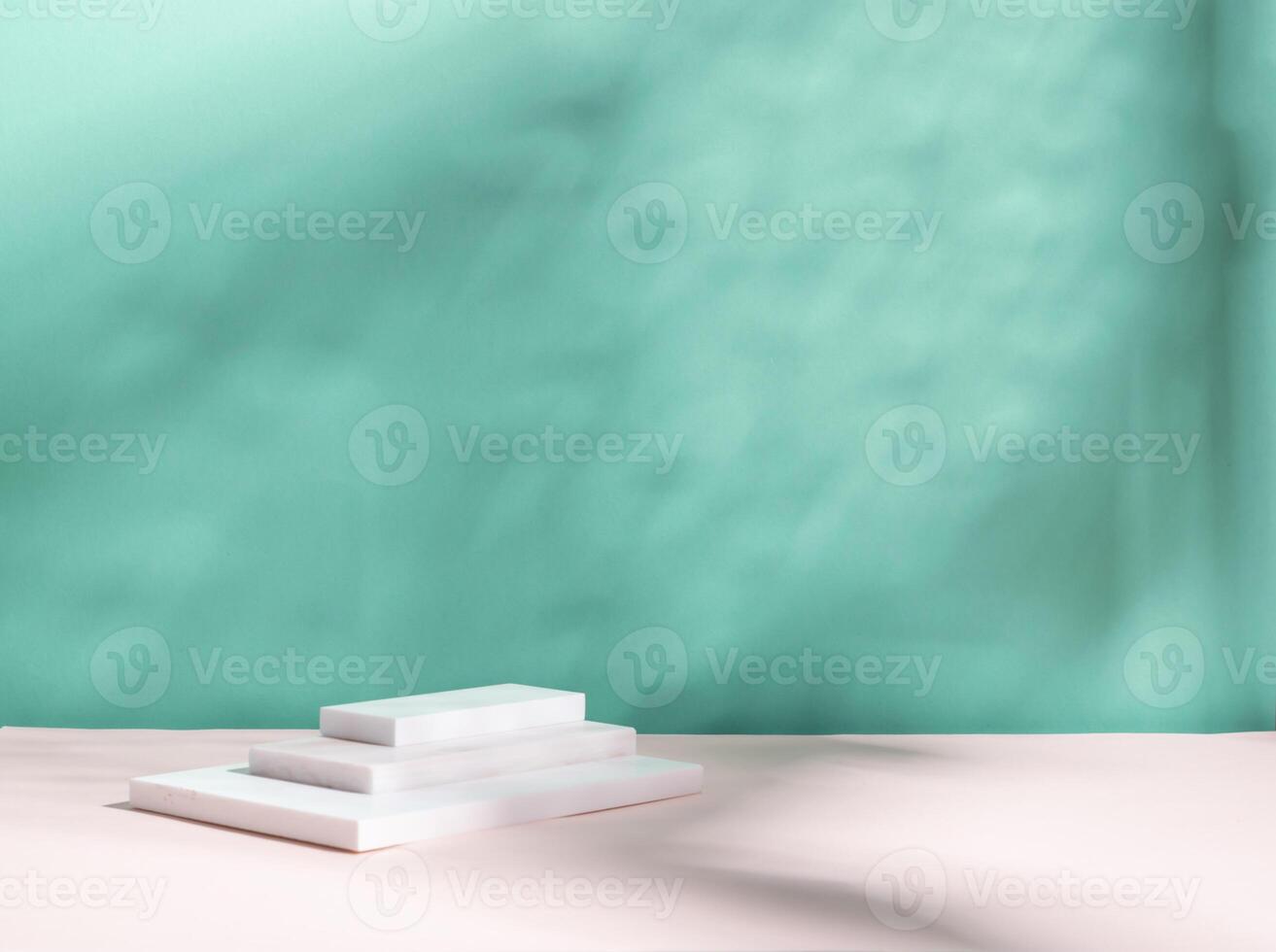Abstract podium pedestal from white marble, blue menthol empty background deep shadows from plant photo