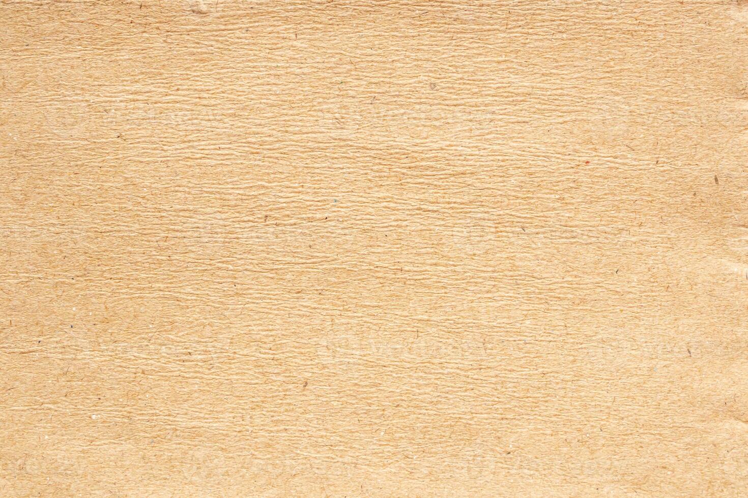 Abstract crumpled and creased recycle brown paper texture background photo